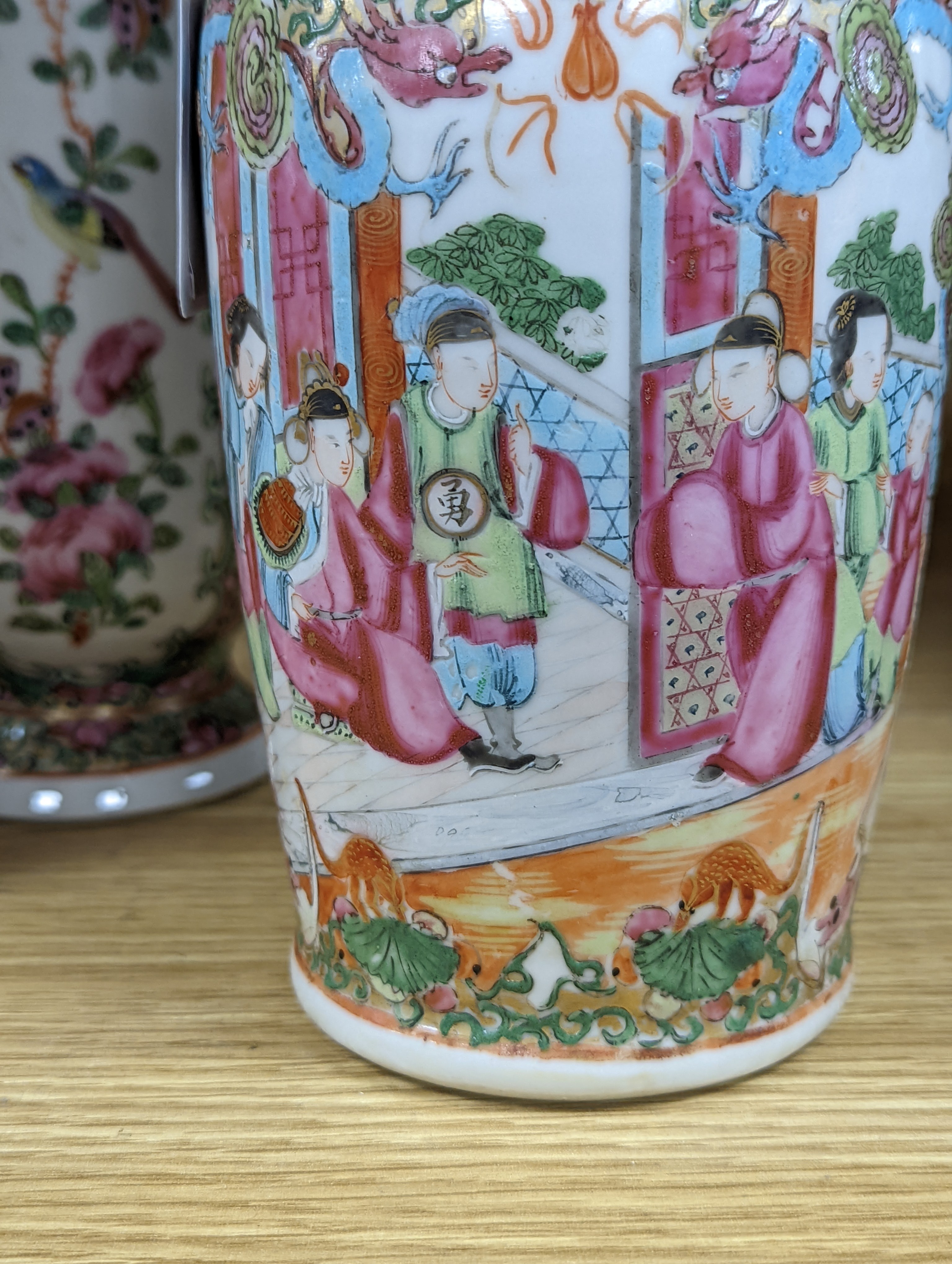 Two Chinese famille rose vases, late 19th century, tallest 26 cm, one wood stand, some restoration